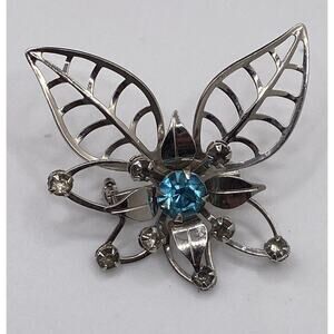 Vintage BN BUGBEE & NILES Clear Blue Crystal Center Flower & Leaf Brooch